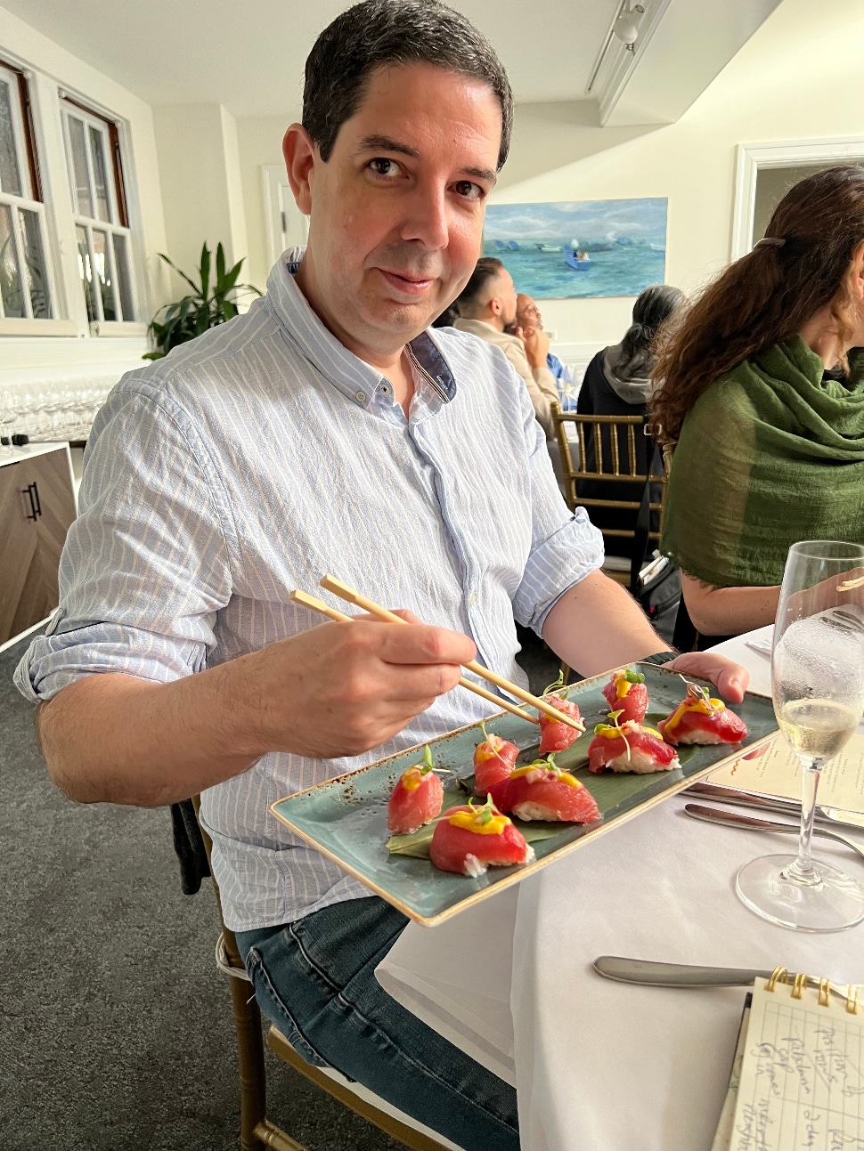 Peruvian guest Pablo Bariola trying the amuse bouché with micro green and pepper sauce.