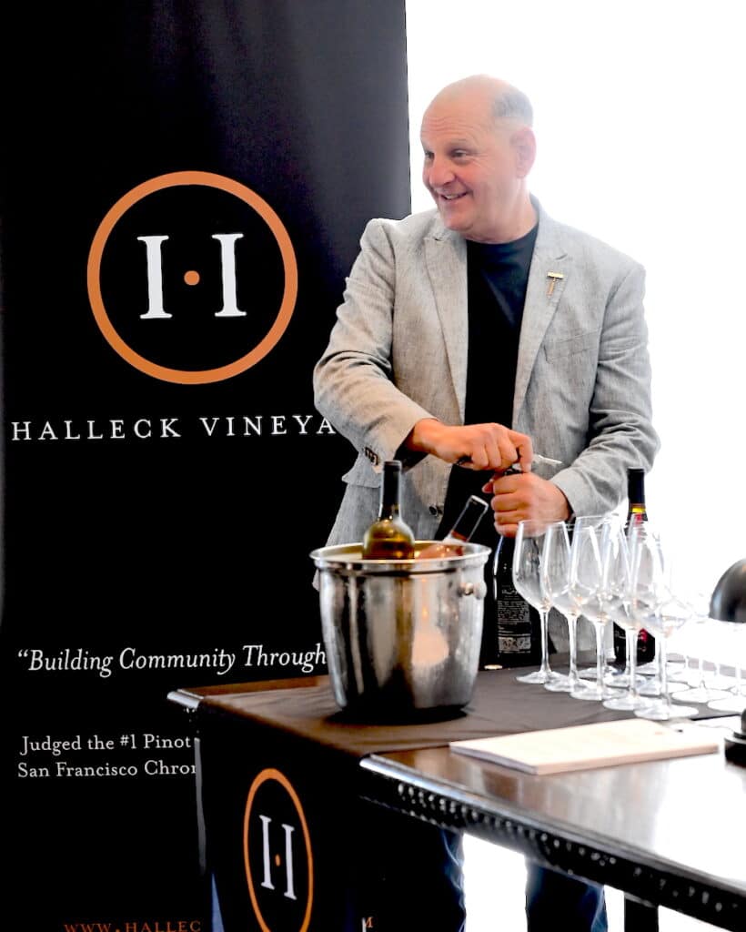 Winemaker Ross Halleck of Halleck Vineyard opens a bottle of his popular California Sauvignon Blanc for wine club members and guests at a private wine tasting event held at The Amarano Hotel in Los Angeles. The event provided an amazing experience for attendees, offering a fun and new way to tour top family vineyards and discover some of the best spots in California. Join the Halleck Vineyard Wine Club and experience the best of what the world of wine has to offer.